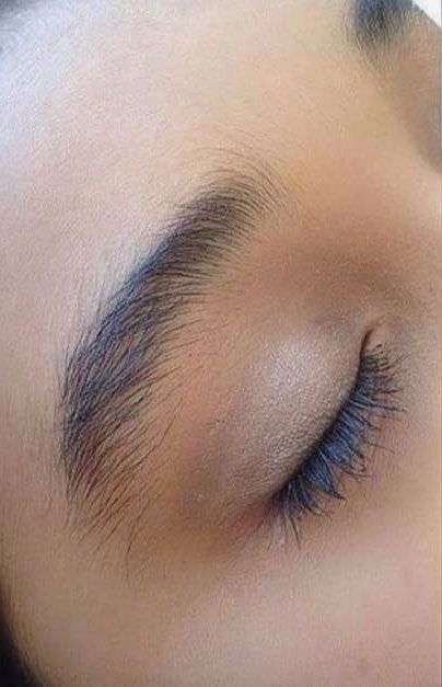 Eyebrow before threading, unshaped brow