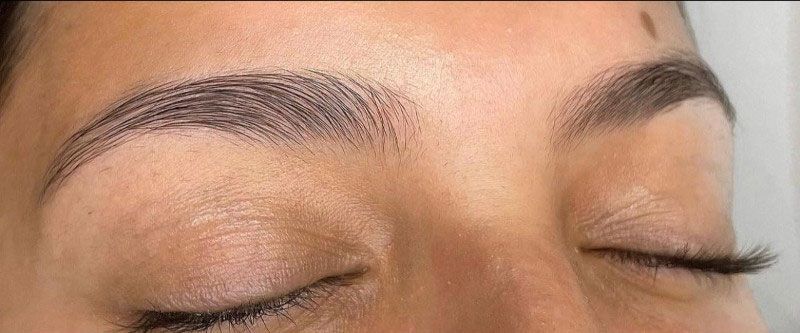 Eyebrow before threading, unshaped brow